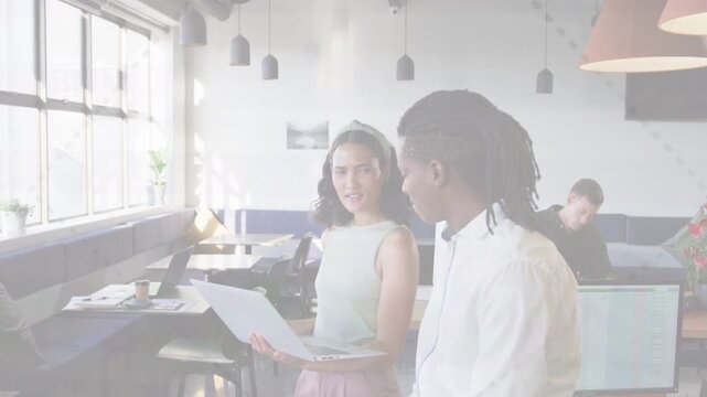 Woman presenting document to male peer in business animated callouts marking key lines for review
