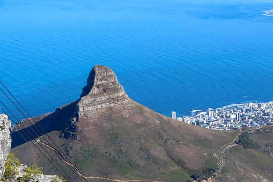Aerial view Lions Head peak Cape Town. Iconic mountain landscape overlooking blue Atlantic ocean coastal city horizon scenic travel destination South Africa