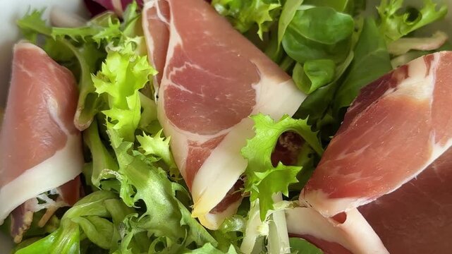 salad jamon meat mixed green salad leaves meat dish tasty snack fresh, delicious, gourmet food background rustic food on the table, top view, copy space