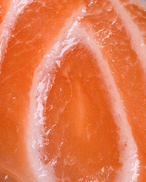 Salmon texture lines square background raw fish pattern close up