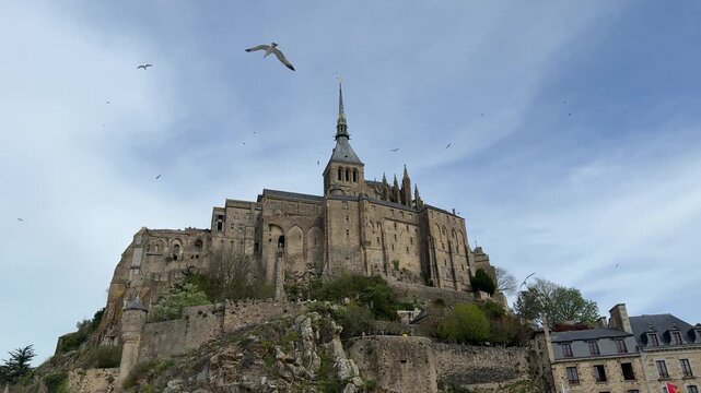Visit to Mont Saint Michel in Normandy with views of the historic abbey on a clear day