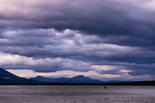 stormy clouds hover over lagoon and san beach, Hermanus, South Africa