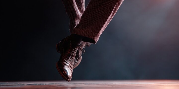 tap dancer is tap dancing - movement and rhythm on display as tap dancing man tap dances