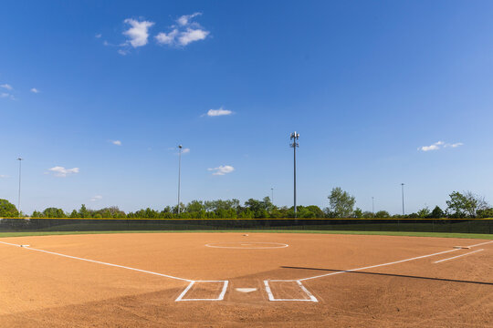 softball fastpitch field empty blank nobody background field stadium outside outdoors day