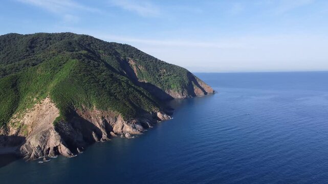 Aerial Nature Mediterranean sea Landscape with Turquoise Sea or Ocean Bay and Empty Sand Beach. Beautiful Vacation and Tourism Destination Drone top view Pull in Video Shot in Jijel Algeria.