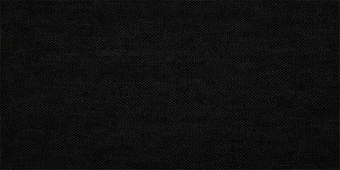 Fototapeta premium Black fabric textile background, showing the texture of woven material, creating depth and a sense of luxury.