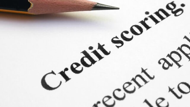 Credit Scoring Document with Pencil Close Up on White Background