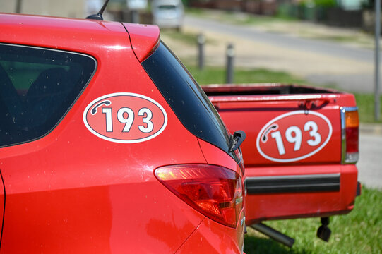 Firefighter vehicle with 193 emergency number. Close up of firefighter's car with 193 on side.