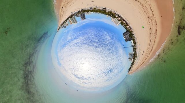 Inverted tiny planet aerial drone beach stock video 4k