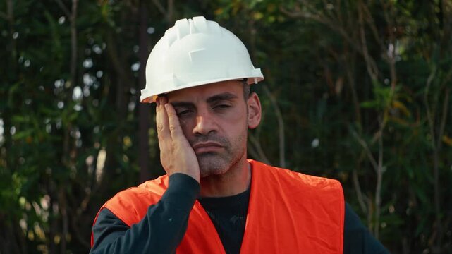 construction worker desperate from too much work
