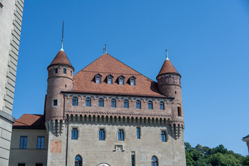 Fototapeta premium Historic castle building with towers in Lausanne, Switzerland