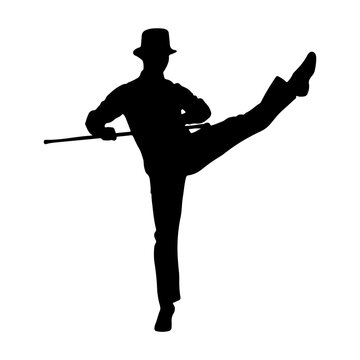 Silhouette of a man performing a high kick with a cane.