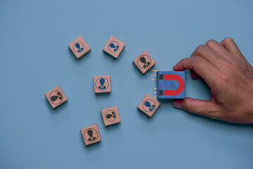 Customer retention strategy concept with magnet attracting user icons represent loyalty, client...