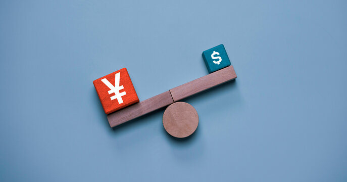 Currency comparison concept showing Chinese yuan and US dollar on balance scale, represent exchange rate, global finance, economic competition, trade balance, investment strategy and financial market