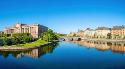 Fototapeta premium Stockholm City Hall and Waterfront Buildings Reflected in Calm Water.
