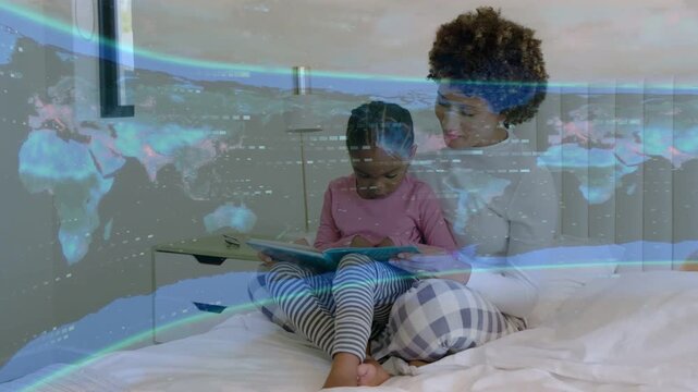 Mom opening book, guiding child on bed, reading for education while blue map overlay drifting front