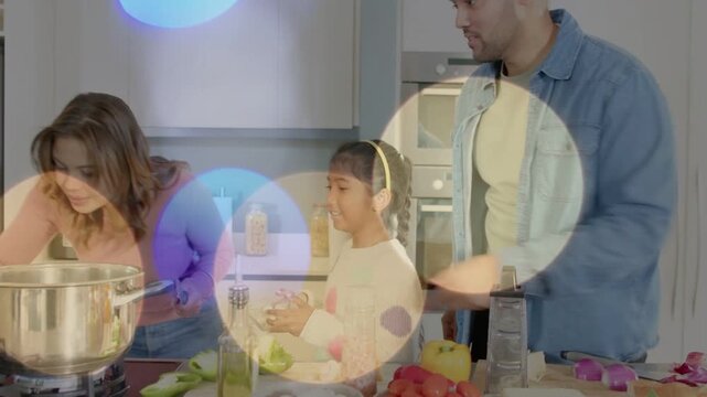 Woman stirring pot moving to pan, man grating and passing ingredients, child watching home cooking