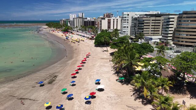 At low tide, Ponta Verde reveals reefs and natural pools that turn the sea into a shallow, crystal-clear landscape, Macei&oacute;, Alagoas, Brazil