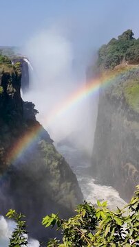Wild Water Fall At Victoria Falls In Matabeleland North Zimbabwe. Nature Waterfall. Zambezi River Landscape. Victoria Falls At Matabeleland North Zimbabwe. Southern Africa. Tourism Travel.