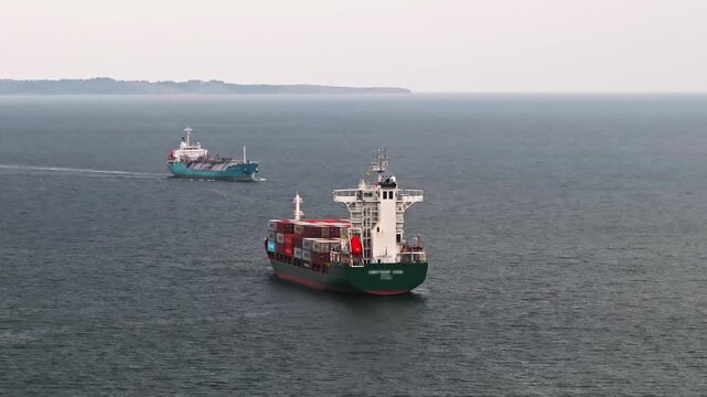 Aerial View of Container Ship Loaded with Shipping Containers &ndash; Global Cargo Transport and Maritime Trade in 4K