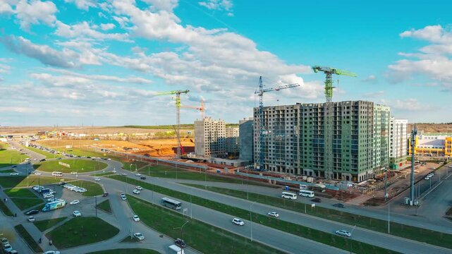 time-lapse panorama of the city of Orenburg, construction work, and traffic on the street