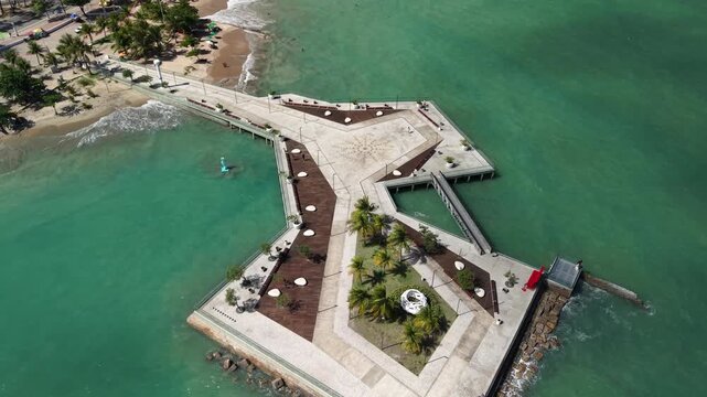 Aerial view of Marco dos Corais during high tide - Observation pier built on the reefs of Ponta Verde Beach, inaugurated in April 2022, a tourist attraction in Macei&oacute;, Alagoas, Brazil