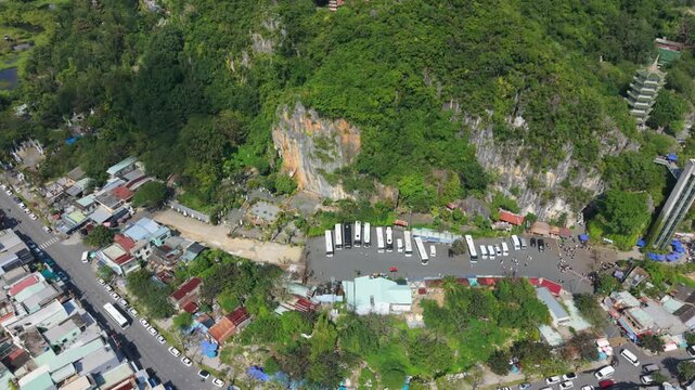 Vietnam, Da Nang Aerial View Da Nang Tourist Terminal Under Limestone Cliff, Panorama Of Coaches And Cars In Pickup Bays, Arrival Hub With Stalls And Trailheads, Visitors Gathering For Hikes
