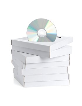 Stack of white media storage boxes.