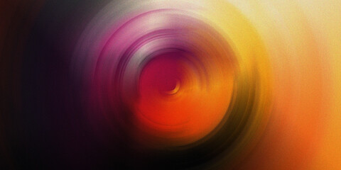 Dramatic radial zoom burst with warm orange and magenta hues creating intense glowing light effect against dark background. © md
