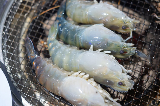 Giant river prawns on grill are popular Thai cuisine. Close up