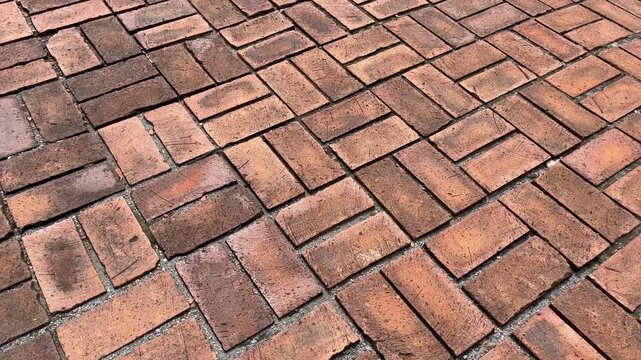 Red Brick Paving Texture with Herringbone Pattern for Background