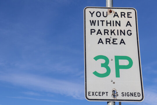 three hour parking sign against sky