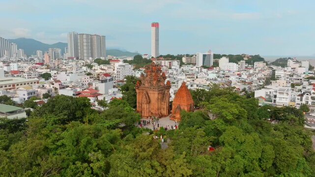 Po Nagar Cham Towers, Nha Trang, Vietnam. Tourists visit the ancient Cham temple complex, a historical and cultural landmark.