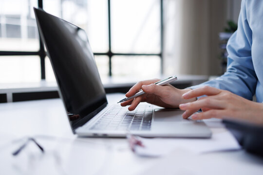Professional hands using laptop for business communication