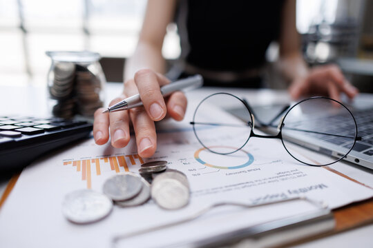 Working on financial reports analyzing budget and investments