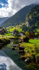 Obraz premium A serene village nestled between a river and mountains