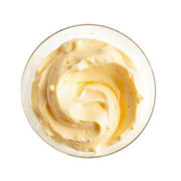 Mayonnaise sauce condiment creamy swirl in a glass bowl isolated on a transparent background for culinary food design
