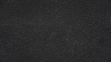 Fototapeta premium Dark black rough wall textured background wall