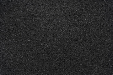 Fototapeta premium Dark black rough wall textured background wall