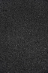 Fototapeta premium Dark black rough wall textured background wall