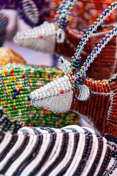 Handcrafted African Beaded Wire Animal Sculptures colorful seed beads woven over metal wire frames.