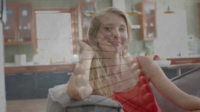Woman focusing, turning to camera, smiling, engaging with highlights and lines overlay, marketing