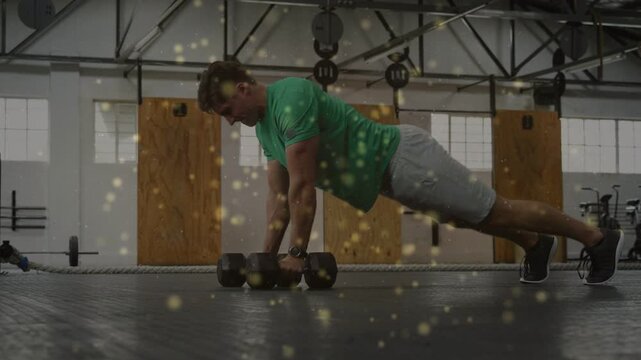From plank man alternating push-ups and 1-arm dumbbell rows, golden overlay, building core strength
