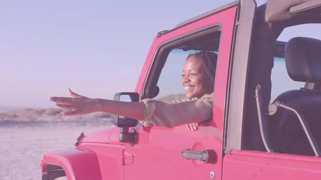 Woman resting on red Jeep window, feeling breeze, reaching out, animated glow tracing hand, auto