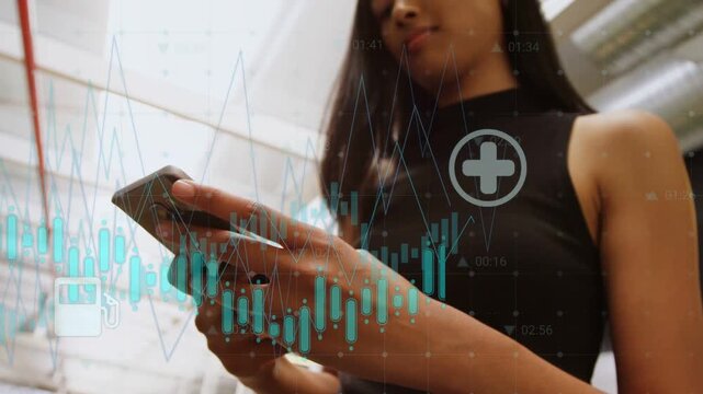 Woman scrolling phone while camera zooming in, overlays of stock charts and icons showing finance