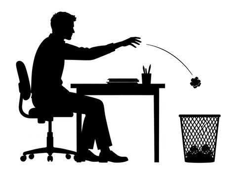 man throwing a paper crumb into a bin
