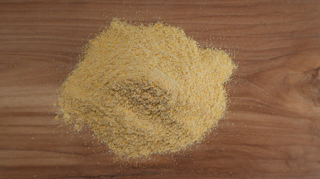 Top View of Corn Flour on Wooden Surface