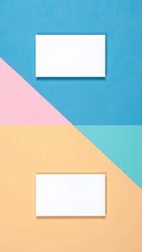a colorful textured wall with two blank white cards hanging side by side, ready for custom text or minimalist artwork