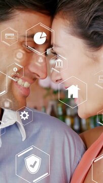 Vertical video: Couple leaning in at bar activating hex UI on faces seeking dating match
