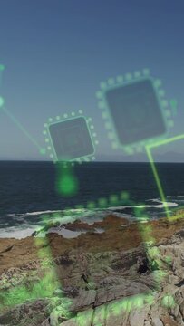 Vertical video: Rocky shoreline and sea showing sensor data on start, HUD chips drifting for tech